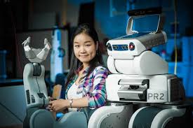 Director of Open Roboethics Institute, Ajung Moon featured with a robot